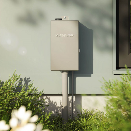 Kichler Smart Transformer against a green house